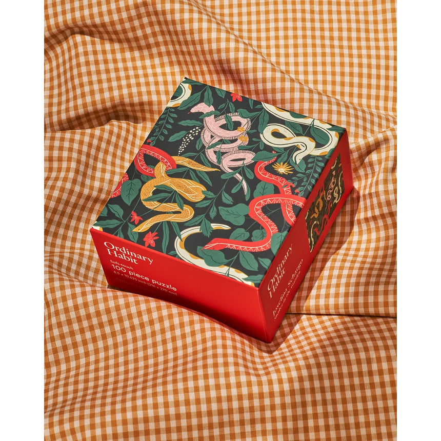 PUZZLE - SNAKES IN THE GARDEN DI JOSEFINA SCHARGO